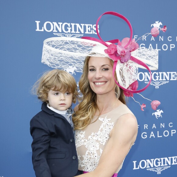 Sophie Thalmann (robe Christophe Guillarmé) et son fils Robin Soumillon au Prix de Diane Longines à l'hippodrome de Chantilly, le 16 juin 2019. © Marc Ausset-Lacroix/Bestimage