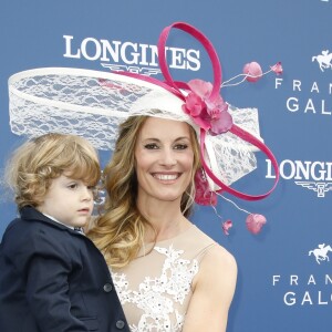 Sophie Thalmann (robe Christophe Guillarmé) et son fils Robin Soumillon au Prix de Diane Longines à l'hippodrome de Chantilly, le 16 juin 2019. © Marc Ausset-Lacroix/Bestimage