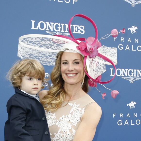 Sophie Thalmann (robe Christophe Guillarmé) et son fils Robin Soumillon au Prix de Diane Longines à l'hippodrome de Chantilly, le 16 juin 2019. © Marc Ausset-Lacroix/Bestimage