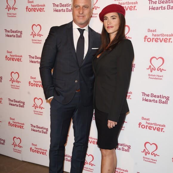 David Ginola et sa compagne Maeva Denat arrivent à la soirée "The Beating Hearts Ball" à Londres, le 27 février 2019.