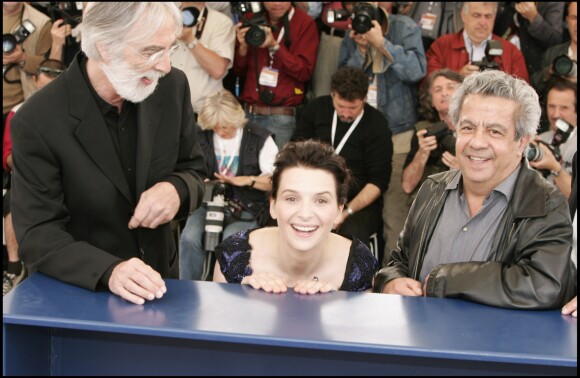 Michael Haneke, Juliette Binoche et Maurice Bénichou présentent "Caché" de Michael Haneke au Festival de Cannes le 14 mai 2005.