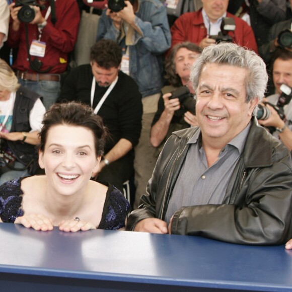 Michael Haneke, Juliette Binoche et Maurice Bénichou présentent "Caché" de Michael Haneke au Festival de Cannes le 14 mai 2005.