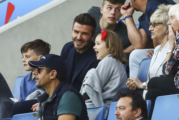 David Beckham et sa fille Harper lors du match de football de la coupe du monde féminine Norvège / Angleterre au Havre le 27 juin 2019 © Gwendoline Le Goff / Panoramic / Bestimage