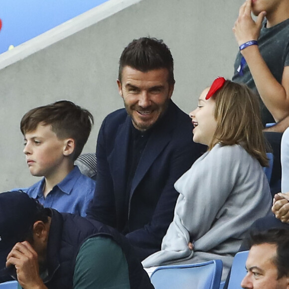 David Beckham et sa fille Harper lors du match de football de la coupe du monde féminine Norvège / Angleterre au Havre le 27 juin 2019 © Gwendoline Le Goff / Panoramic / Bestimage