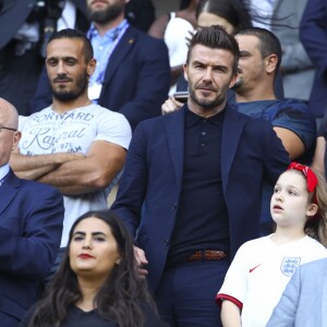 David Beckham et sa fille Harper lors du match de football de la coupe du monde féminine Norvège / Angleterre au Havre le 27 juin 2019 © Gwendoline Le Goff / Panoramic / Bestimage