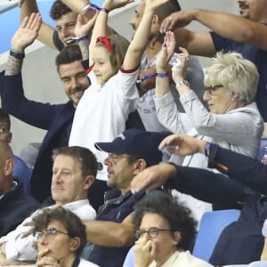 David Beckham avec sa fille Harper, sa mère Sandra Georgina West et Sue Campbell dans les tribunes lors du quart de finale de la Coupe du Monde Féminine de football opposant l'Angleterre à la Norvège au stade Océane au Havre, France, le 27 juin 2019. L'Angleterre a gagné 3-0. © Gwendoline Le Goff/Panoramic/Bestimage