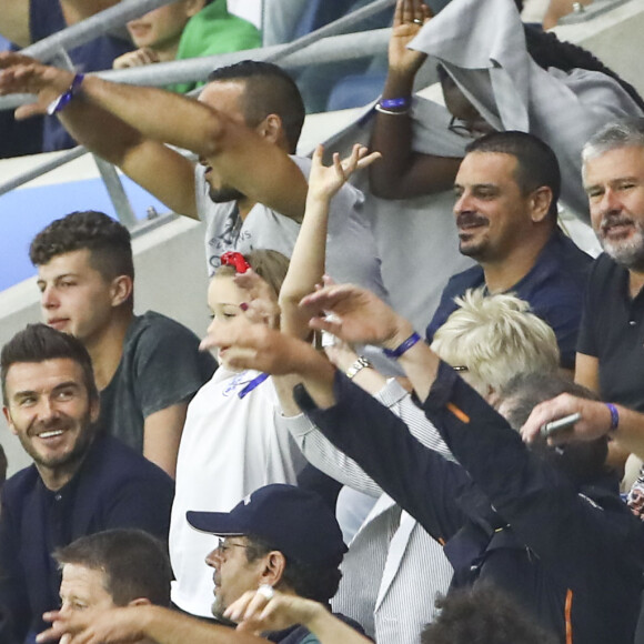David Beckham avec sa fille Harper et sa mère Sandra Georgina West dans les tribunes lors du quart de finale de la Coupe du Monde Féminine de football opposant l'Angleterre à la Norvège au stade Océane au Havre, France, le 27 juin 2019. L'Angleterre a gagné 3-0. © Gwendoline Le Goff/Panoramic/Bestimage