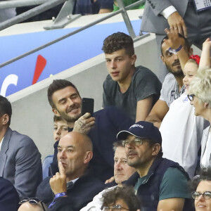 David Beckham avec sa fille Harper et sa mère Sandra Georgina West dans les tribunes lors du quart de finale de la Coupe du Monde Féminine de football opposant l'Angleterre à la Norvège au stade Océane au Havre, France, le 27 juin 2019. L'Angleterre a gagné 3-0. © Gwendoline Le Goff/Panoramic/Bestimage