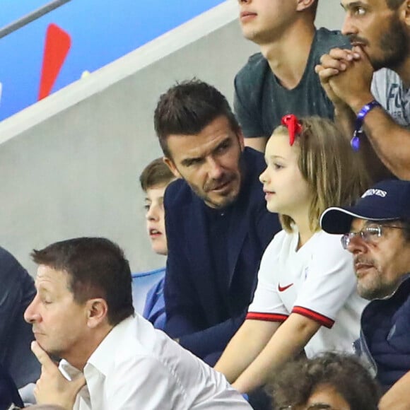 David Beckham avec sa fille Harper et sa mère Sandra Georgina West dans les tribunes lors du quart de finale de la Coupe du Monde Féminine de football opposant l'Angleterre à la Norvège au stade Océane au Havre, France, le 27 juin 2019. L'Angleterre a gagné 3-0. © Gwendoline Le Goff/Panoramic/Bestimage