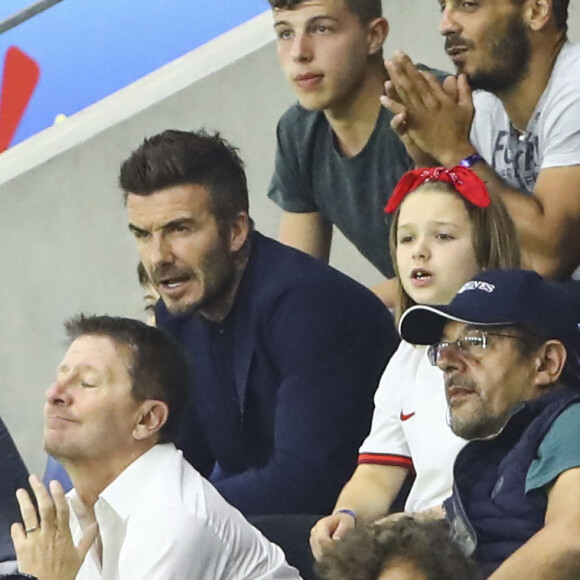 David Beckham avec sa fille Harper et sa mère Sandra Georgina West dans les tribunes lors du quart de finale de la Coupe du Monde Féminine de football opposant l'Angleterre à la Norvège au stade Océane au Havre, France, le 27 juin 2019. L'Angleterre a gagné 3-0. © Gwendoline Le Goff/Panoramic/Bestimage
