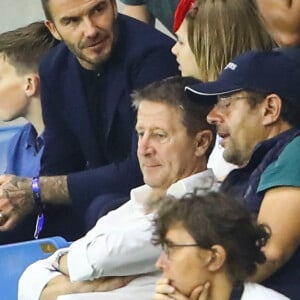 David Beckham avec sa fille Harper et sa mère Sandra Georgina West dans les tribunes lors du quart de finale de la Coupe du Monde Féminine de football opposant l'Angleterre à la Norvège au stade Océane au Havre, France, le 27 juin 2019. L'Angleterre a gagné 3-0. © Gwendoline Le Goff/Panoramic/Bestimage