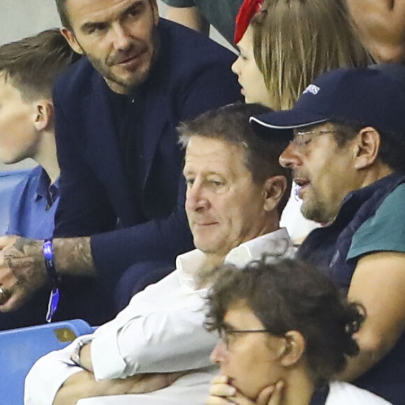 David Beckham avec sa fille Harper et sa mère Sandra Georgina West dans les tribunes lors du quart de finale de la Coupe du Monde Féminine de football opposant l'Angleterre à la Norvège au stade Océane au Havre, France, le 27 juin 2019. L'Angleterre a gagné 3-0. © Gwendoline Le Goff/Panoramic/Bestimage