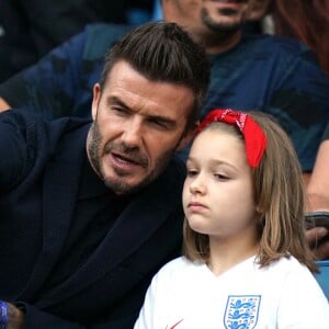 David Beckham et sa fille Harper lors du match de football de la coupe du monde féminine Norvège / Angleterre au Havre le 27 juin 2019