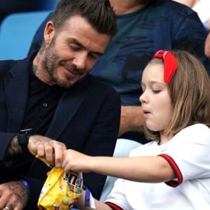 David Beckham et sa fille Harper lors du match de football de la coupe du monde féminine Norvège / Angleterre au Havre le 27 juin 2019