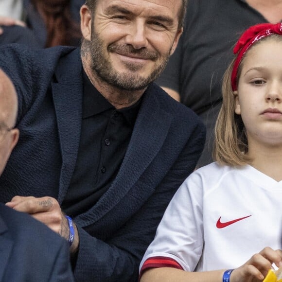 David Beckham et sa fille Harper lors du match de football de la coupe du monde féminine Norvège / Angleterre au Havre le 27 juin 2019