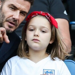 David Beckham et sa fille Harper lors du match de football de la coupe du monde féminine Norvège / Angleterre au Havre le 27 juin 2019