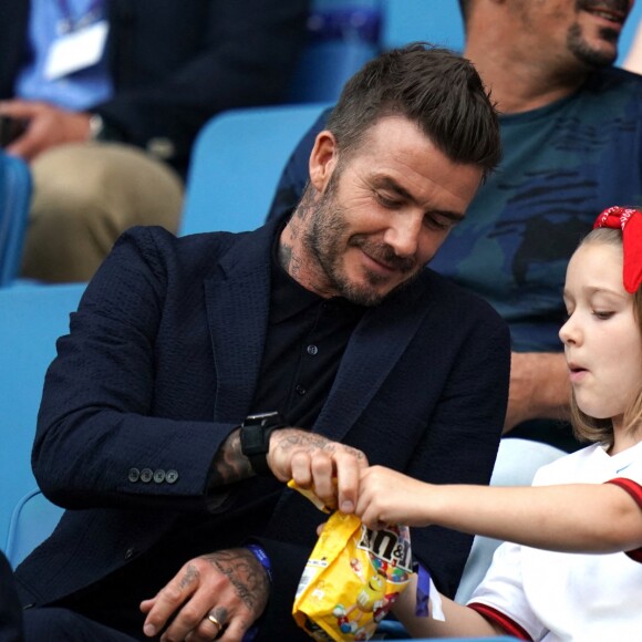 David Beckham et sa fille Harper lors du match de football de la coupe du monde féminine Norvège / Angleterre au Havre le 27 juin 2019