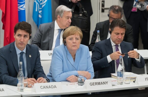 Justin Trudeau (Premier Ministre du Canada), Angela Merkel (chancelière d'Allemagne) et Guiseppe Conte (premier Ministre de l'Italie) - Evènement parallèle organisé par le Premier Ministre japonais sur le thème "économie numérique" au centre de congrès Intex Osaka lors du G20 à Osaka, Japon, le 28 juin 2019. © Jacques Witt/Pool/Bestimage