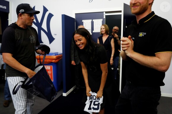 Le prince Harry, duc de Sussex, et Meghan Markle, duchesse de Sussex vont saluer les équipes de baseball "Boston Red Sox" et "New York Yankees" dans leurs vestiaires dans le cadre des Invictus Games 2019 au London Stadium. Londres, le 29 juin 2019.