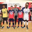  Maëva Coucke, Gianni Capoue, fils de Rachel-Legrain-Trapani (à droite), et Thibaud Vézirian avec les joueurs Loïc Rémy, Jérémy Pied, Luiz Araujo et Boubakary Soumare lors de la soirée de présentation des nouveaux maillots du LOSC par l'équipementier New Balance pour la saison 2019-2020 à Lille le 4 juillet 2019. 