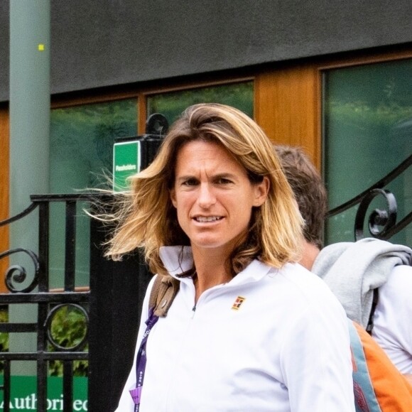 Exclusif - Amélie Mauresmo et Lucas Pouille à la sortie de leur entrainement lors du tournoi de tennis de Wimbledon à Londres. Le 26 juin 2019