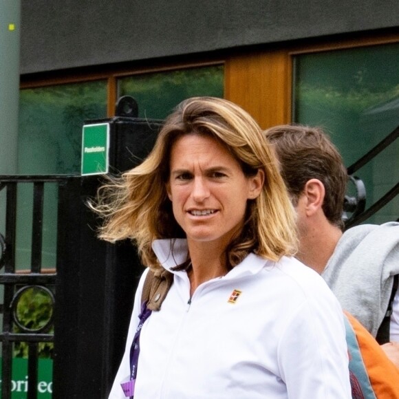 Exclusif - Amélie Mauresmo et Lucas Pouille à la sortie de leur entrainement lors du tournoi de tennis de Wimbledon à Londres. Le 26 juin 2019