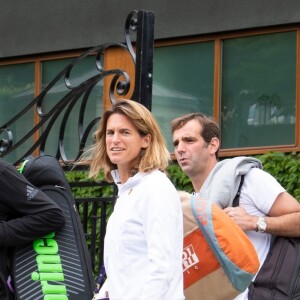 Exclusif - Amélie Mauresmo et Lucas Pouille à la sortie de leur entrainement lors du tournoi de tennis de Wimbledon à Londres. Le 26 juin 2019