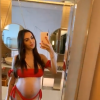 Nabilla, enceinte de son premier enfant, affiche son baby bump en bikini sexy sur Instagram, le 15 juillet 2019.
