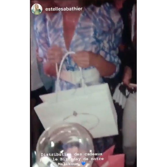 Malika Ménard entourée pour ses 32 ans à Paris, le 17 juillet 2019.