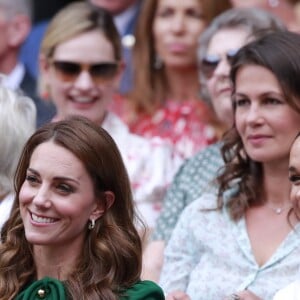 Catherine (Kate) Middleton, duchesse de Cambridge, Meghan Markle, duchesse de Sussex, et Pippa Middleton dans les tribunes lors de la finale femme de Wimbledon "Serena Williams - Simona Halep (2/6 - 2/6) à Londres, le 13 juillet 2019.