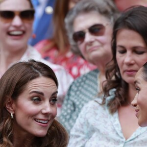 Catherine (Kate) Middleton, duchesse de Cambridge, Meghan Markle, duchesse de Sussex, et Pippa Middleton dans les tribunes lors de la finale femme de Wimbledon "Serena Williams - Simona Halep (2/6 - 2/6) à Londres, le 13 juillet 2019.