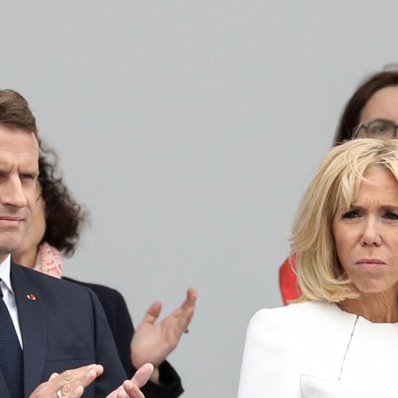 Emmanuel Macron, président de la République Française, et la Première dame Brigitte Macron lors du 139ème défilé militaire du 14 juillet sur les Champs-Elysées, jour de la Fête Nationale. Paris, le 14 juillet 2019. © Lemouton-Gorassini-Perusseau/Bestimage