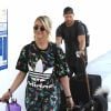 Exclusif - Julianne Hough et son mari Brooks Laich à l'aéroport de Los Angeles, le 3 août 2019.