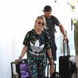 Exclusif - Julianne Hough et son mari Brooks Laich à l'aéroport de Los Angeles, le 3 août 2019.