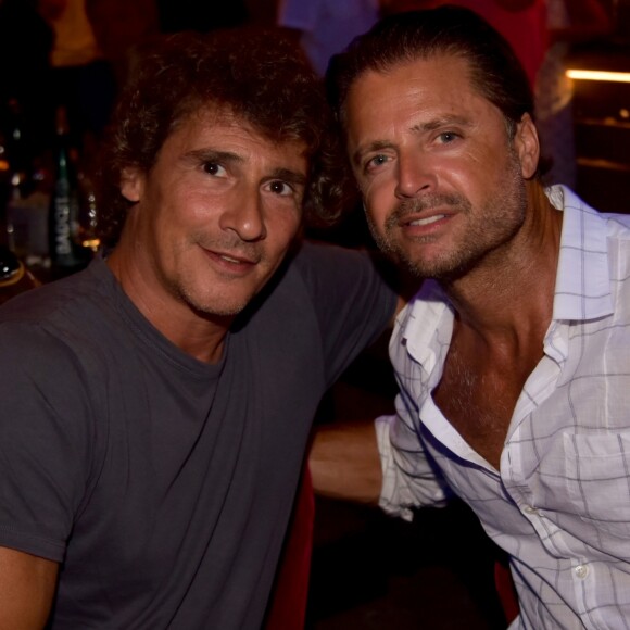 Exclusif - Pierre Rambaldi et David Charvet lors de la soirée d'ouverture du St-Barth Family Festival 2019 au restaurant "Le Ti' St Barth" sur l'île de Saint-Barthélemy, Antilles française, France, le 8 août 2019. © Xavier Merchet-Thau/PhotoStBarth/Bestimage