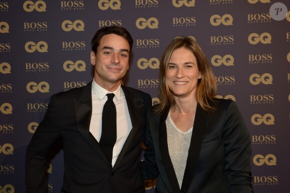 Julian Bugier et sa femme Claire Fournier lors de la soirée "L'homme de l'année GQ 2014" au Musée d'Orsay, à Paris le 19 novembre 2014.