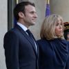 Le président Emmanuel Macron, la première dame Brigitte Macron - Le président de la République française et sa femme accueillent le roi et la reine de Jordanie au palais de l'Elysée à Paris le 29 mars 2019. © Stéphane Lemouton / Bestimage