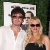 Jake Marcus, Nicollette Sheridan - Première du film "Running with the devil" au Writers Guild Theater à Beverly Hills. le 16 septembre 2019