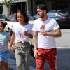 Matt Pokora, sa compagne Christina Milian enceinte et sa fille Violet Nash - Enceinte et radieuse, C.Milian se rend au glacier McConnell avec compagnon M.Pokora et sa fille V.Nash pour le goûter après avoir acheté des vêtements pour bébés. La chanteuse 'Dip it Low' et son compagnon ont annoncé sa grossesse la semaine dernière via Instagram. C'est le premier enfant du couple et le premier enfant de M.Pokora. Los Angeles, le 3 août 2019.