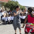 Le prince Harry et Meghan Markle, duchesse de Sussex, le 23 septembre 2019 au Cap en Afrique du Sud, lors de la première journée de leur visite officielle. Ils ont découvert dans le township Nyanga l'associatin Justice Desk, qui apprend aux enfants leurs droits et les aide à assurer leur sécurité. Elle propose des cours d'auto-defense et une formation à l'autonomie des femmes pour les jeunes filles de la communauté.