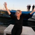Exclusif - Brigitte Bardot arrive pour poser avec l'équipage de "Brigitte Bardot Sea Shepherd", le célèbre trimaran d'intervention de l'organisation écologiste, sur le port de Saint-Tropez, le 26 septembre 2014