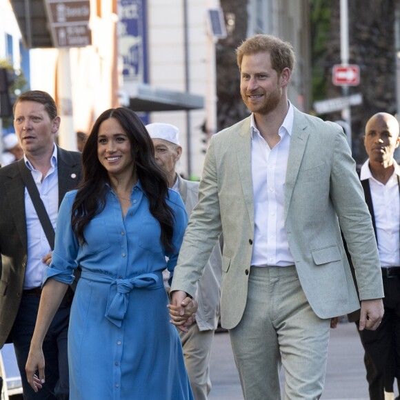 Le prince Harry et Meghan Markle, en robe Veronica Beard, visitent le quartier de Bo Kaap dit "Cape Malay" au Cap, Afrique du Sud, le 23 septembre 2019.