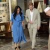 Le prince Harry et Meghan Markle, en robe Veronica Beard, visitent le quartier de Bo Kaap dit "Cape Malay" au Cap, Afrique du Sud, le 23 septembre 2019.
