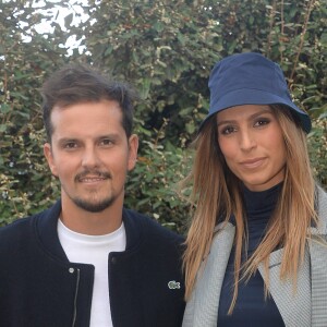 Laury Thilleman (Miss France 2011) et son compagnon Juan Arbelaez - People au défilé Lacoste Collection Prêt-à-Porter Printemps/Eté 2020 lors de la Fashion Week de Paris, le 1er octobre 2019. © Veeren Ramsamy-Christophe Clovis/Bestimage