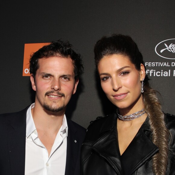 Laury Thilleman (Miss France 2011) et son compagnon Juan Arbelaez au photocall de la soirée "Orange" sur la plage de l'hôtel Majectic lors du 72ème Festival International du Film de Cannes, le 18 mai 2019. © Denis Guignebourg/Bestimage  Celebrities at the photocall of "Orange Party" held on Hotel Majestic's beach during the 72nd International Cannes Film Festival. May 18th, 2019.18/05/2019 - Cannes