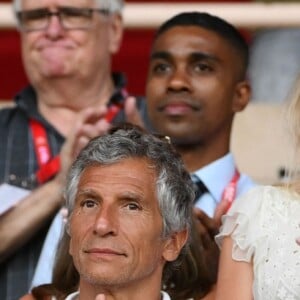 Didier Deschamps, Nagui, Cyril Rool, sa femme au second rang Mélanie Page, à gauche, et des amis durant le Match de football de Ligue 1 opposant Monaco à Lille au stade Louis II le 18 août 2018. Pour leur première rencontre à domicile de la saison 2018/2019, les monégasques n'ont obtenu qu'un match nul 0 - 0. © Bruno Bebert/Bestimage