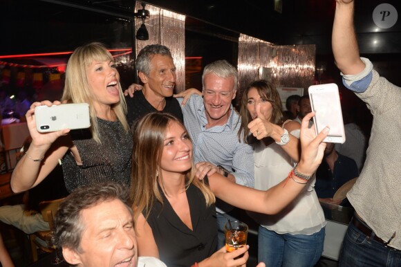 Didier Deschamps fête sa victoire avec sa femme Claude, Nagui et sa femme Mélanie Page et des amis à la Gioia et au VIP Room à Saint-Tropez, le 21 juillet 2018. © Rachid Bellak/Bestimage