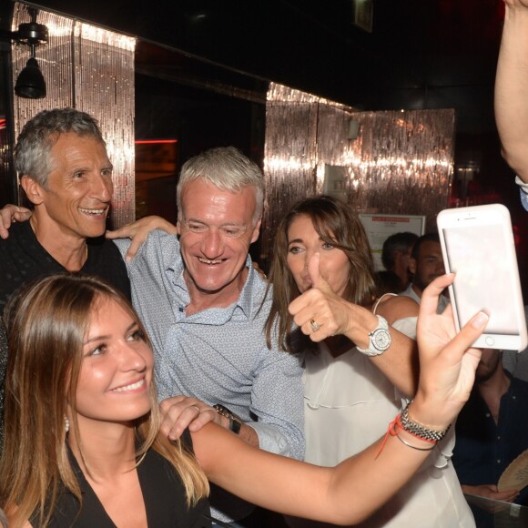 Didier Deschamps fête sa victoire avec sa femme Claude, Nagui et sa femme Mélanie Page et des amis à la Gioia et au VIP Room à Saint-Tropez, le 21 juillet 2018. © Rachid Bellak/Bestimage