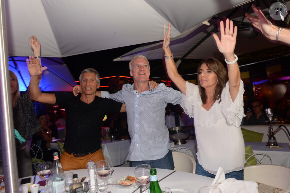 Didier Deschamps fête sa victoire avec sa femme Claude, Nagui et sa femme Mélanie Page et des amis à la Gioia et au VIP Room à Saint-Tropez, le 21 juillet 2018. © Rachid Bellak/Bestimage