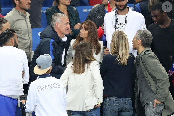 Didier Deschamps et sa femme Claude, Nagui et sa femme Mélanie Page - Les joueurs retrouvent leur famille dans les tribunes à la fin du match de quart de finale de l'UEFA Euro 2016 France-Islande au Stade de France à Saint-Denis le 3 juillet 2016. © Cyril Moreau / Bestimage
